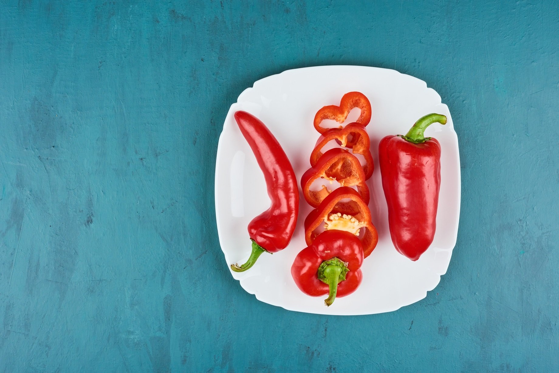 red-chili-peppers-white-plate